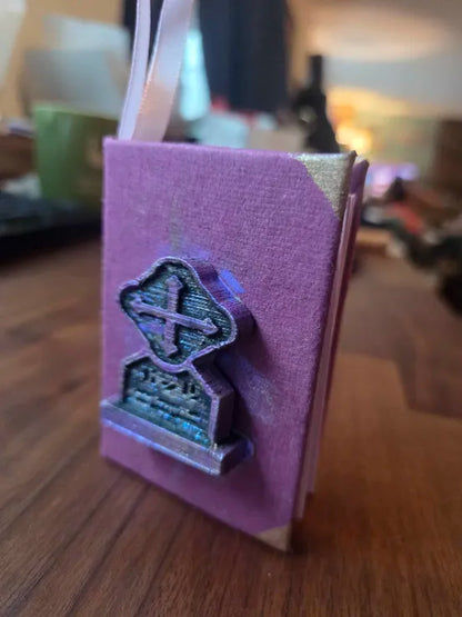 Grim Book Ornament