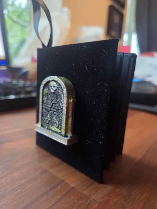 Grim Book Ornament