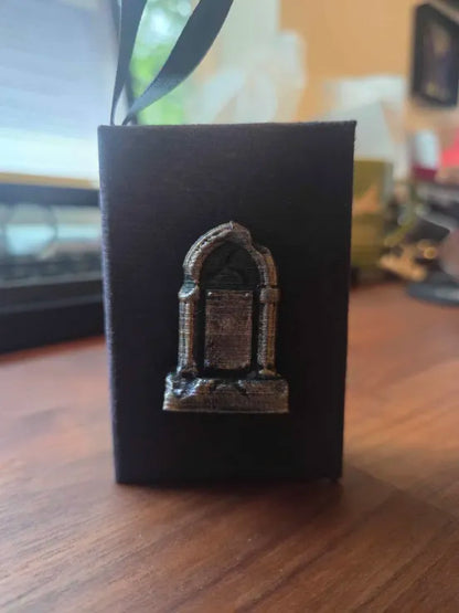 Grim Book Ornament