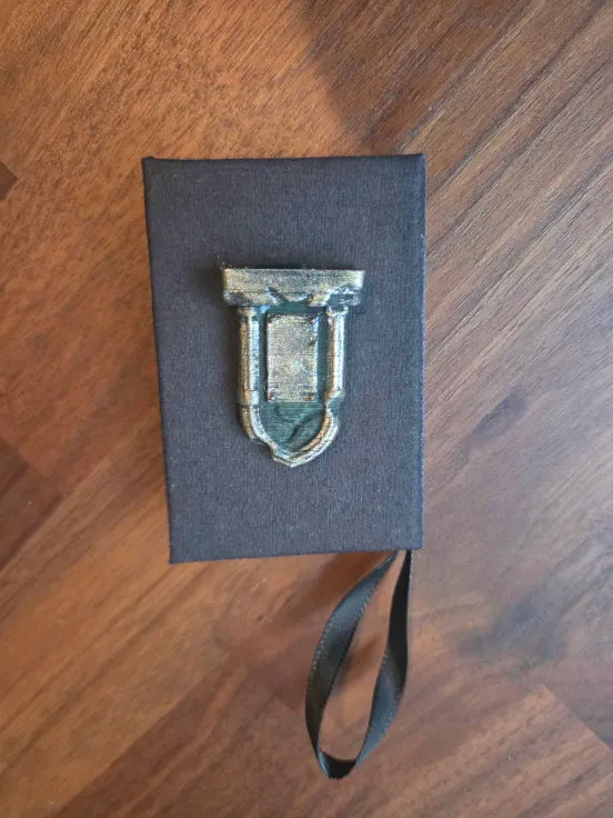Grim Book Ornament